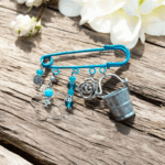 Broche  épingle bleue, élégance florale et charme vintage